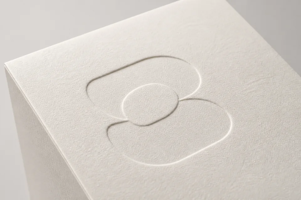 Debossed recessed detail on premium paper