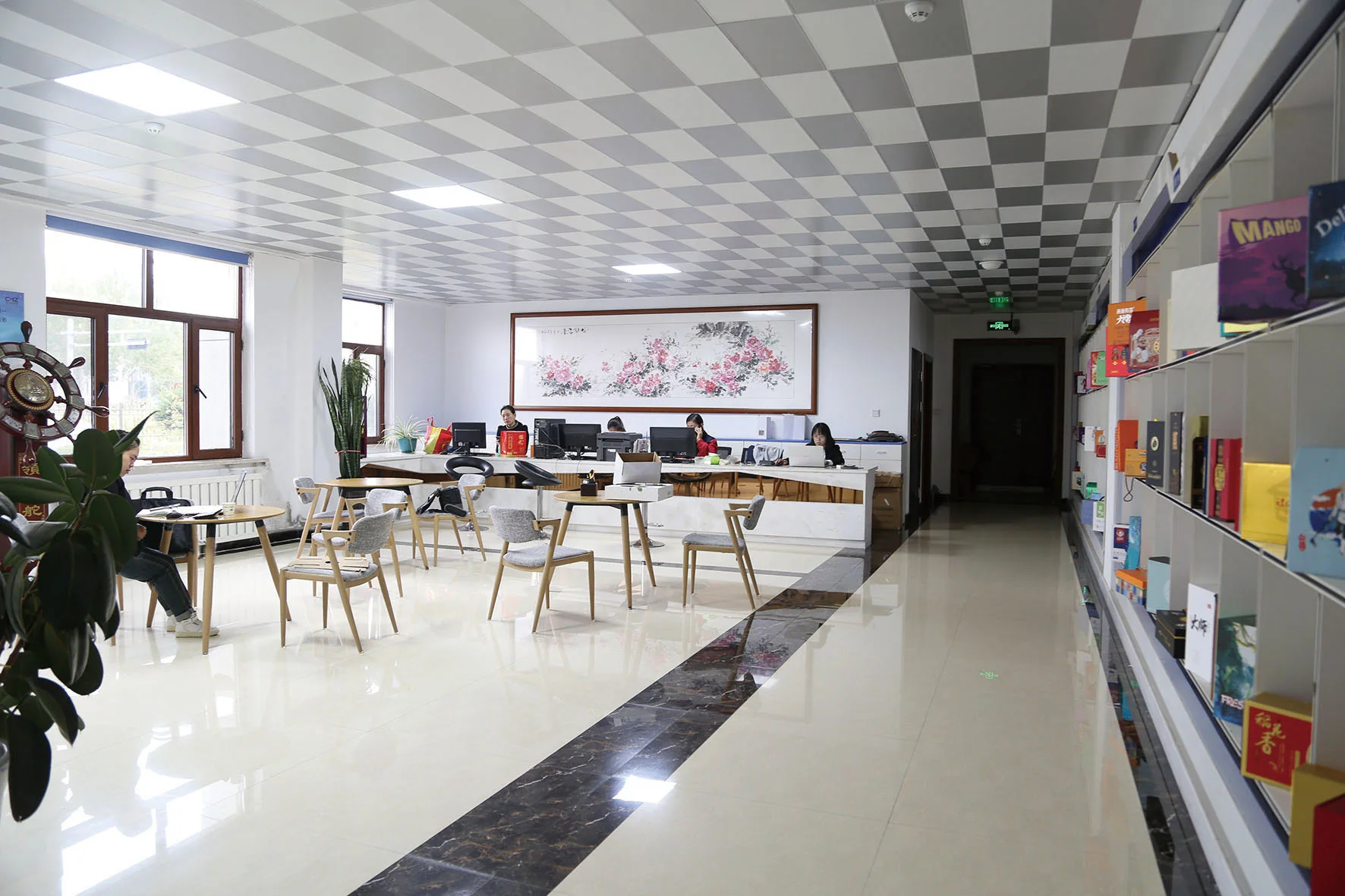 Huizhi office with staff desks and packaging samples on display