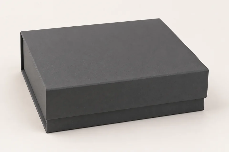 Matte laminated paperboard with low-glare finish