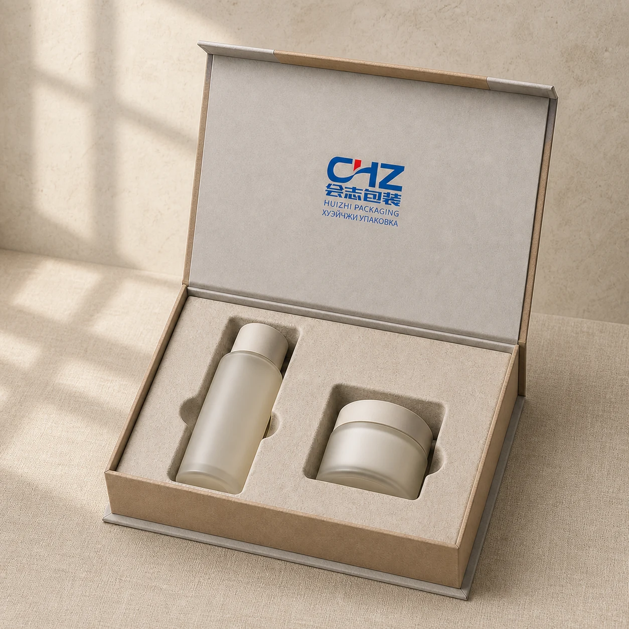 Open natural kraft book-style skincare box with a molded-fiber insert holding one bottle and one cream jar.